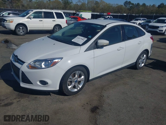 2013 Ford Focus SE with VIN 1FADP3F25DL223541, listed as a IAAI auction lot 41877904 with 192,484 mi miles and . Bid and sale history available at DreamBid. Image 17.