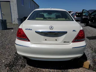2006 Acura RL z VIN JH4KB16576C012132, wystawiony jako Copart lot #61897805 z przebiegiem 143 101 mil mil oraz Szkoda całkowita • Salvage title. Historia ofert i sprzedaży dostępna na DreamBid. Obrazek 6.