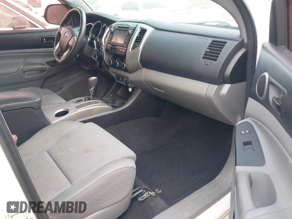 2013 Toyota Tacoma z VIN 5TFLU4EN2DX076815, wystawiony jako IAAI lot #41344839 z przebiegiem 311 083 mil mil oraz . Historia ofert i sprzedaży dostępna na DreamBid. Obrazek 5.