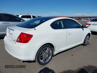 2005 Scion tC with VIN JTKDE167850026021, listed as a IAAI auction lot 41709118 with 130,895 mi miles. Bid and sale history available at carsss.com. Image 4.