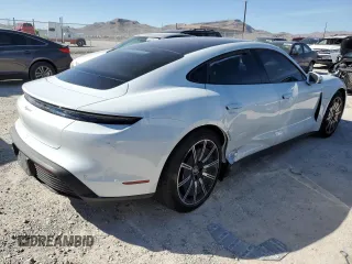2021 Porsche Taycan z VIN WP0AA2Y13MSA17480, wystawiony jako Copart lot #41578233 z przebiegiem Nie podano mil oraz . Historia ofert i sprzedaży dostępna na DreamBid. Obrazek 3.