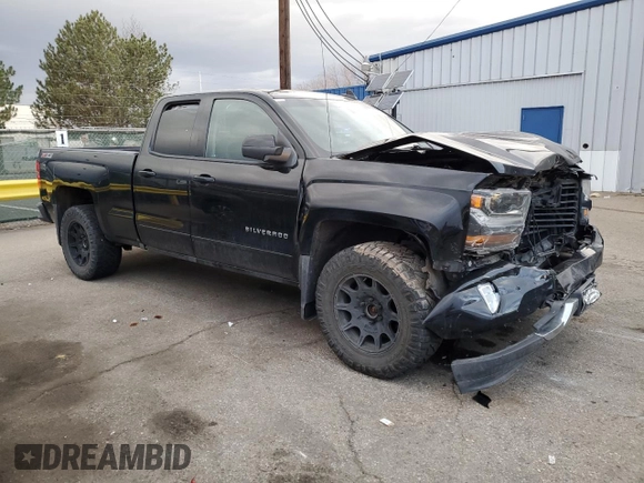 2017 Chevrolet Silverado 1500 LT with VIN 1GCVKREC1HZ225218, listed as a Copart auction lot 48948735 with 114,627 mi miles and Salvage Title. Bid and sale history available at DreamBid. Image 4.