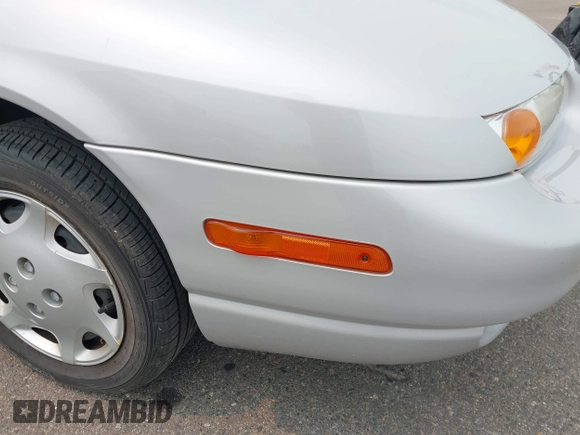 2001 Saturn SL z VIN 1G8ZH52861Z320057, wystawiony jako IAAI lot #42402681 z przebiegiem 111 375 mil mil oraz . Historia ofert i sprzedaży dostępna na DreamBid. Obrazek 12.