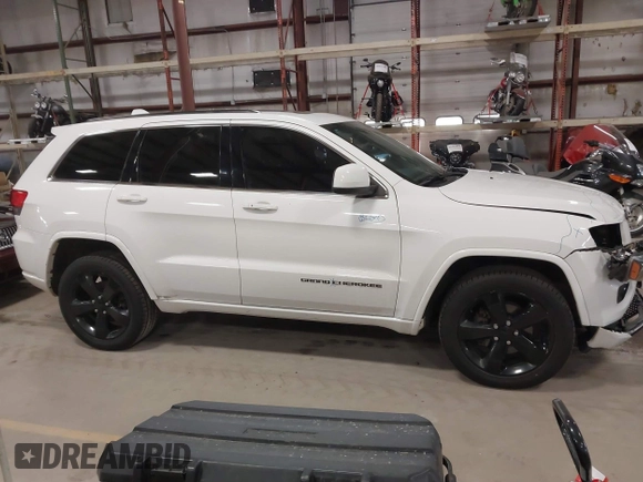 2015 Jeep Grand Cherokee Laredo with VIN 1C4RJFAG4FC747532, listed as a IAAI auction lot 41764541 with 196,385 mi miles. Bid and sale history available at carsss.com. Image 13.