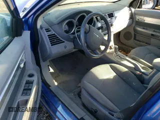 2007 Chrysler Sebring Touring z VIN 1C3LC56K77N523429, wystawiony jako Copart lot #46944025 z przebiegiem Nie podano mil oraz Szkody całkowita. Historia ofert i sprzedaży dostępna na DreamBid. Obrazek 8.