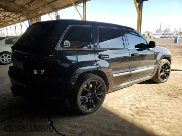 2008 Jeep Grand Cherokee SRT-8 with VIN 1J8HR78358C160930, listed as a Copart auction lot 80562324 with 137,147 mi miles and Salvage Title. Bid and sale history available at carsss.com. Image 3.