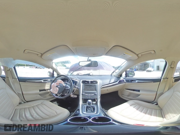 2013 Ford Fusion SE Hybrid z VIN 3FA6P0LU7DR197801, wystawiony jako Copart lot #60468095 z przebiegiem 169 215 mil mil oraz Szkoda całkowita • Salvage title. Historia ofert i sprzedaży dostępna na DreamBid. Obrazek 14.