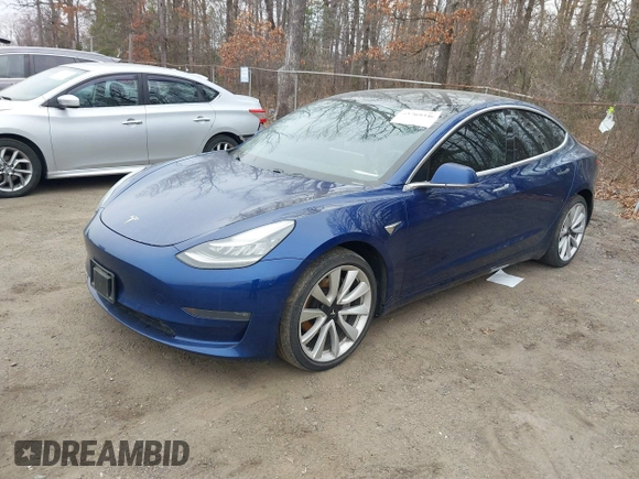 2019 Tesla Model 3 Long Range with VIN 5YJ3E1EB9KF454007, listed as a IAAI auction lot 41769346 with 141,609 mi miles. Bid and sale history available at carsss.com. Image 19.