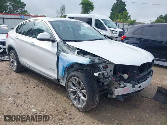 2015 BMW X4 xDrive28i with VIN 5UXXW3C51F0M86668, listed as a IAAI auction lot 42489071 with 59,694 mi miles and . Bid and sale history available at DreamBid. Image 1.