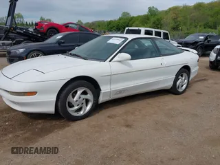 1995 Ford Probe z VIN 1ZVLT22B7S5124333, wystawiony jako IAAI lot #42259542 z przebiegiem 109 313 mil mil oraz . Historia ofert i sprzedaży dostępna na DreamBid. Obrazek 2.