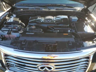2012 Infiniti QX56 8-passenger with VIN JN8AZ2NC7C9316699, listed as a Copart auction lot 74810114 with 188,879 mi miles and Salvage Title. Bid and sale history available at carsss.com. Image 12.