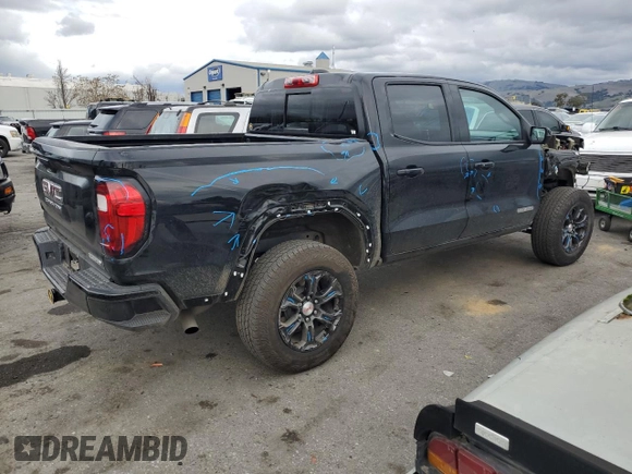2023 GMC Canyon 2WD Elevation with VIN 1GTP5BEK8P1195517, listed as a Copart auction lot 43479755 with 21,633 mi miles and Salvage Title. Bid and sale history available at DreamBid. Image 3.