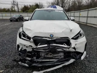2023 BMW X1 xDrive28i z VIN WBX73EF06P5W06767, wystawiony jako Copart lot #51383755 z przebiegiem 25 605 mil mil oraz Szkody całkowita. Historia ofert i sprzedaży dostępna na DreamBid. Obrazek 5.