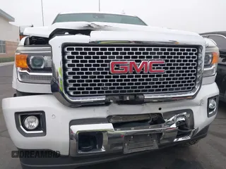 2015 GMC Sierra 2500HD Denali with VIN 1GT120E85FF681680, listed as a IAAI auction lot 42081711 with 67,676 mi miles and . Bid and sale history available at DreamBid. Image 6.