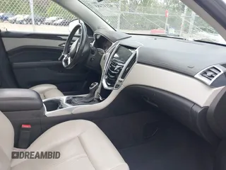 2013 Cadillac SRX Performance Collection z VIN 3GYFNDE35DS636363, wystawiony jako IAAI lot #42147483 z przebiegiem 116 894 mil mil oraz . Historia ofert i sprzedaży dostępna na DreamBid. Obrazek 5.