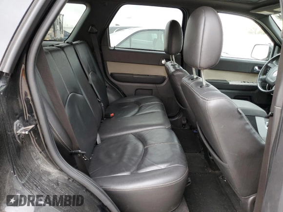 2009 Mercury Mariner Premier with VIN 4M2CU97G39KJ24297, listed as a Copart auction lot 77472674 with 153,316 mi miles and Salvage Title. Bid and sale history available at carsss.com. Image 12.