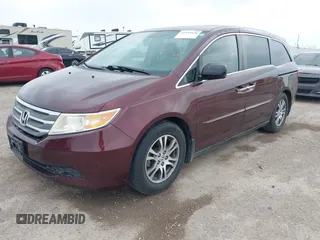 2012 Honda Odyssey EX-L with VIN 5FNRL5H61CB108301, listed as a IAAI auction lot 41939536 with 225,476 mi miles and . Bid and sale history available at DreamBid. Image 19.