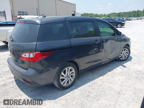 2015 Mazda 5 Sport with VIN JM1CW2BL7F0183114, listed as a IAAI auction lot 42409805 with 174,606 mi miles and . Bid and sale history available at DreamBid. Image 4.