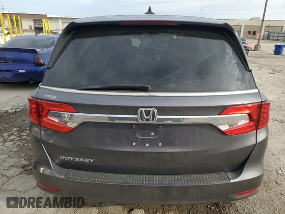2019 Honda Odyssey EX-L with VIN 5FNRL6H75KB042882, listed as a Copart auction lot 49589845 with 90,835 mi miles and Salvage Title. Bid and sale history available at DreamBid. Image 6.