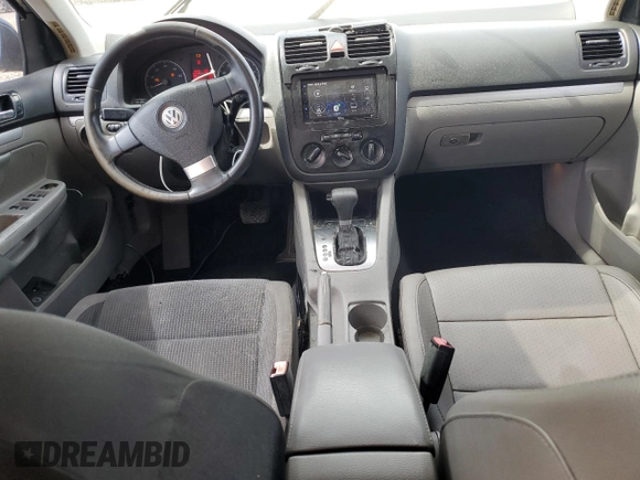 2008 Volkswagen Jetta SE z VIN 3VWRM71K98M082885, wystawiony jako Copart lot #57521515 z przebiegiem 162 641 mil mil oraz Szkoda całkowita • Salvage title. Historia ofert i sprzedaży dostępna na DreamBid. Obrazek 8.