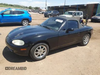 1999 Mazda MX-5 Miata with VIN JM1NB3535X0119662, listed as a Copart auction lot 61870445 with 84,787 mi miles and Clean title. Bid and sale history available at DreamBid. Image 1.