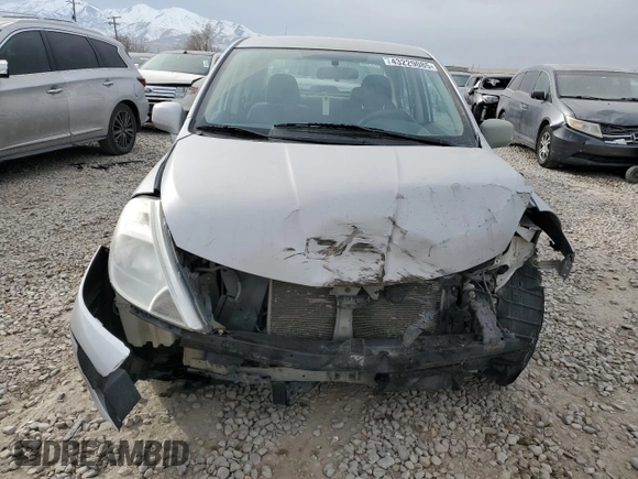 2011 Nissan Versa S with VIN 3N1BC1AP5BL443156, listed as a Copart auction lot 43229085 with 111,165 mi miles and Salvage title. Bid and sale history available at DreamBid. Image 5.