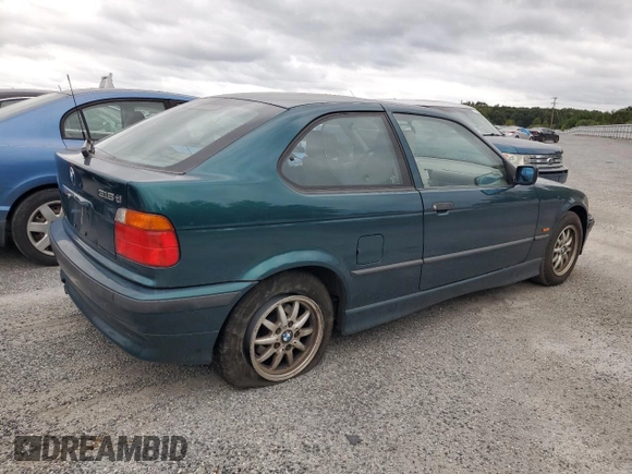 1997 BMW 3 Series 318tiA with VIN WBACG8321VAU39596, listed as a Copart auction lot 72657404 with 0 mi miles and Salvage Title. Bid and sale history available at carsss.com. Image 3.