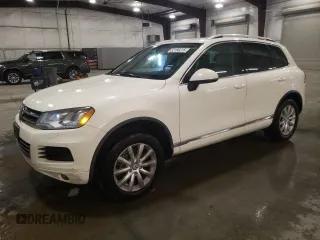 2011 Volkswagen Touareg Sport with VIN WVGFF9BP2BD007160, listed as a Copart auction lot 52150215 with 142,106 mi miles and Clean Title. Bid and sale history available at DreamBid. Image 1.