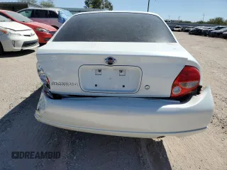 2000 Nissan Maxima GXE z VIN JN1CA31D1YT531301, wystawiony jako Copart lot #72937434 z przebiegiem Nie podano mil oraz Szkoda całkowita • Salvage title. Historia ofert i sprzedaży dostępna na DreamBid. Obrazek 6.