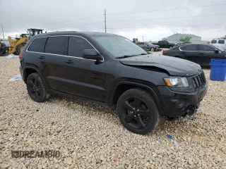 2014 Jeep Grand Cherokee Altitude with VIN 1C4RJFAG3EC580028, listed as a Copart auction lot 50611035 with 146,479 mi miles and Salvage Title. Bid and sale history available at carsss.com. Image 4.