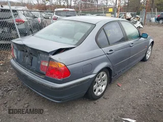 2000 BMW 3 Series 323i with VIN WBAAM3349YFP82121, listed as a IAAI auction lot 41732461 with 999,999 mi miles. Bid and sale history available at carsss.com. Image 4.