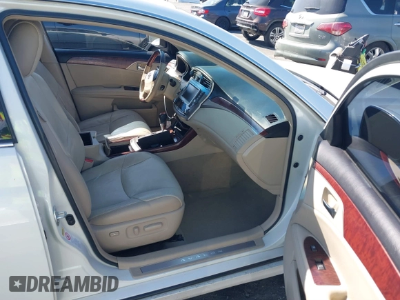 2012 Toyota Avalon with VIN 4T1BK3DB1CU469574, listed as a IAAI auction lot 41633881 with 128,425 mi miles and . Bid and sale history available at DreamBid. Image 5.