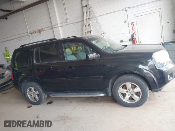 2011 Honda Pilot EX with VIN 5FNYF4H45BB093652, listed as a IAAI auction lot 41872586 with 213,125 mi miles. Bid and sale history available at carsss.com. Image 13.