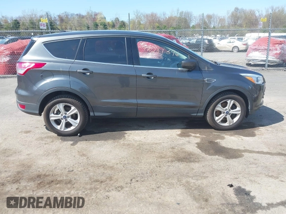 2016 Ford Escape SE with VIN 1FMCU9GX6GUB25849, listed as a IAAI auction lot 42087346 with 189,909 mi miles. Bid and sale history available at carsss.com. Image 13.