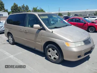 2000 Honda Odyssey EX z VIN 2HKRL1869YH612810, wystawiony jako IAAI lot #42298415 z przebiegiem 285 638 mil mil oraz . Historia ofert i sprzedaży dostępna na DreamBid. Obrazek 1.