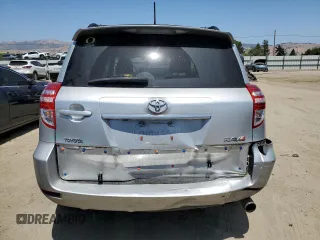 2010 Toyota RAV4 Sport with VIN JTMWF4DVXA5028981, listed as a Copart auction lot 60931165 with 214,075 mi miles and Salvage title. Bid and sale history available at DreamBid. Image 6.