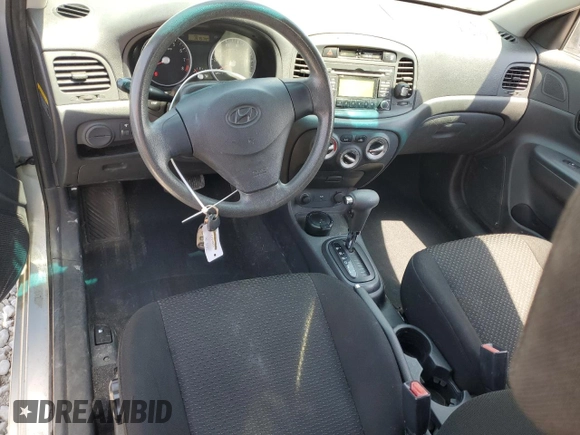 2009 Hyundai Accent Auto GS with VIN KMHCM36C99U136861, listed as a Copart auction lot 59766955 with 157,574 mi miles and Salvage title. Bid and sale history available at DreamBid. Image 8.