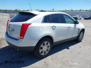 2016 Cadillac SRX Luxury Collection z VIN 3GYFNEE34GS513728, wystawiony jako IAAI lot #41847871 z przebiegiem 109 045 mil mil oraz . Historia ofert i sprzedaży dostępna na DreamBid. Obrazek 4.