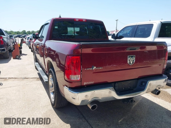 2018 Ram 1500 Lone Star Silver with VIN 1C6RR6LT7JS105492, listed as a IAAI auction lot 42005086 with 84,674 mi miles and . Bid and sale history available at DreamBid. Image 3.