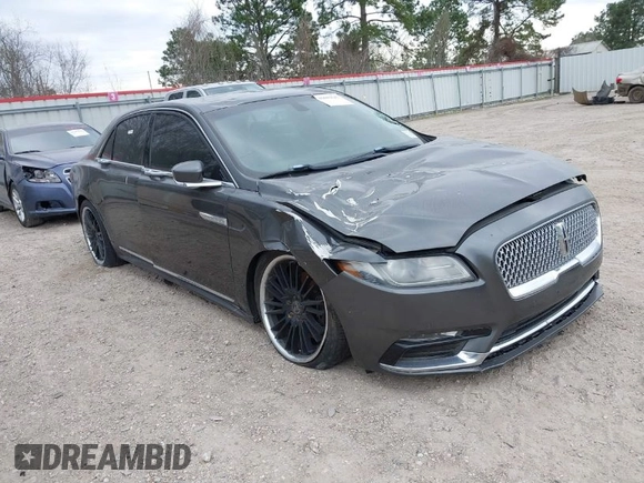 2018 Lincoln Continental Premiere z VIN 1LN6L9PK3J5603389, wystawiony jako IAAI lot #41691647 z przebiegiem 72 139 mil mil oraz . Historia ofert i sprzedaży dostępna na DreamBid. Obrazek 1.
