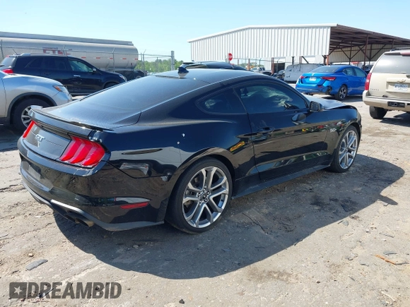 2021 Ford Mustang GT z VIN 1FA6P8CFXM5156002, wystawiony jako IAAI lot #42009222 z przebiegiem 65 939 mil mil oraz . Historia ofert i sprzedaży dostępna na DreamBid. Obrazek 4.
