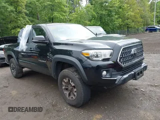 2019 Toyota Tacoma SR with VIN 3TMCZ5AN2KM193343, listed as a IAAI auction lot 42356230 with 61,214 mi miles and . Bid and sale history available at DreamBid. Image 1.