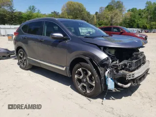 2017 Honda CR-V Touring with VIN 2HKRW2H96HH612495, listed as a Copart auction lot 54195655 with 66,968 mi miles and Salvage Title. Bid and sale history available at DreamBid. Image 4.