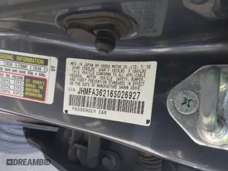 2006 Honda Civic Hybrid with VIN JHMFA36216S026927, listed as a IAAI auction lot 41818654 with 246,972 mi miles. Bid and sale history available at carsss.com. Image 9.
