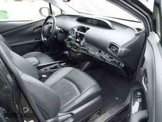 2020 Toyota Prius L Eco with VIN JTDKARFUXL3115471, listed as a IAAI auction lot 41831411 with 48,378 mi miles. Bid and sale history available at carsss.com. Image 5.
