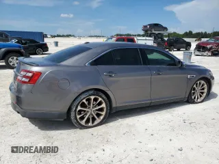 2013 Ford Taurus Limited с VIN 1FAHP2F99DG158940, выставлен на аукционе Copart как лот 66111234 с пробегом 208 640 миль миль и Списание • Salvage title. История ставок и продаж доступна на DreamBid. Изображение 3.