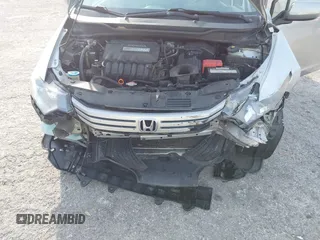 2010 Honda Insight LX with VIN JHMZE2H55AS039854, listed as a IAAI auction lot 42086147 with 153,555 mi miles and . Bid and sale history available at DreamBid. Image 6.