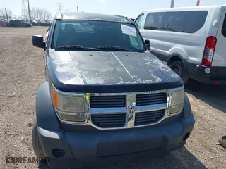 2007 Dodge Nitro SXT with VIN 1D8GU28K57W551957, listed as a IAAI auction lot 41914919 with 139,560 mi miles. Bid and sale history available at carsss.com. Image 12.