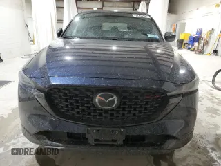 2022 Mazda CX-5 2.5 Turbo with VIN JM3KFBAY1N0636626, listed as a Copart auction lot 52257685 with 41,329 mi miles and Salvage Title. Bid and sale history available at carsss.com. Image 5.