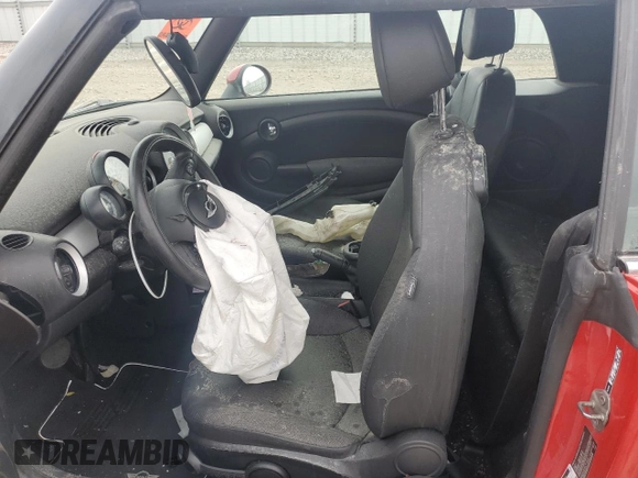 2012 MINI Convertible с VIN WMWZN3C56CT135341, выставлен на аукционе Copart как лот 48611575 с пробегом Не указан миль и Списание • Salvage title. История ставок и продаж доступна на DreamBid. Изображение 7.